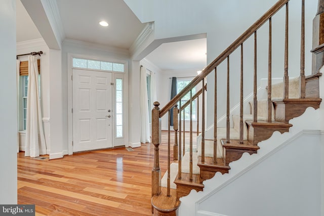16309 Sandy Ridge Ct, Woodbridge, VA 22191 - entrance foyer featuring ornamental molding, wood finished floors, recessed lighting, baseboards, and stairway
