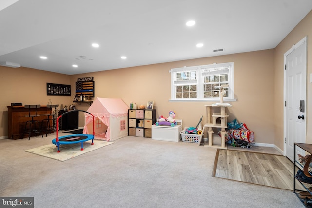 game room featuring carpet, visible vents, and recessed lighting