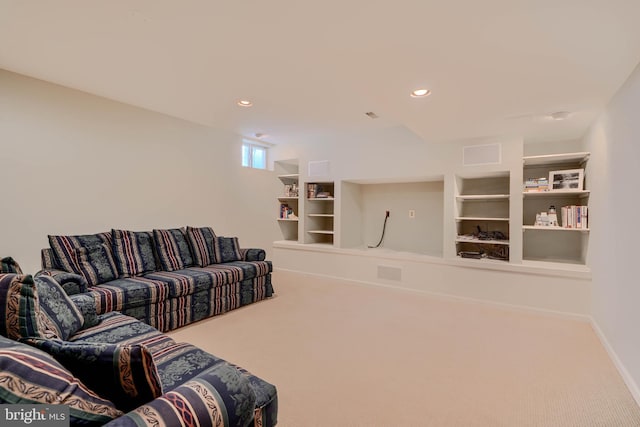 carpeted living room with visible vents, recessed lighting, and baseboards