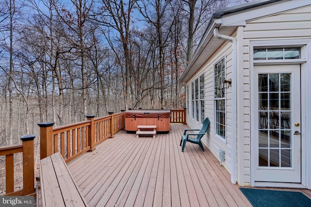 deck with a hot tub