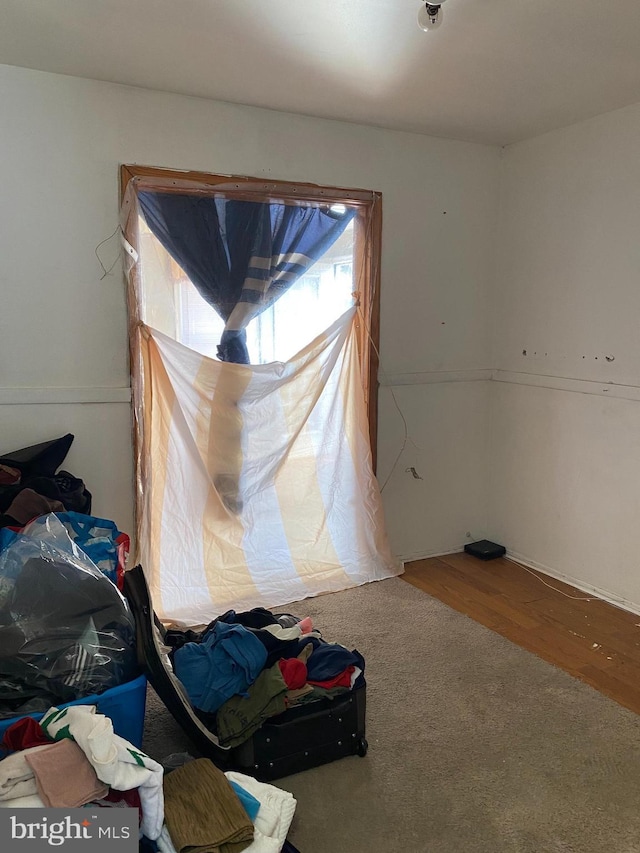 bedroom featuring wood finished floors