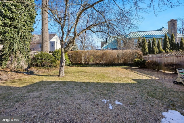 view of yard with fence