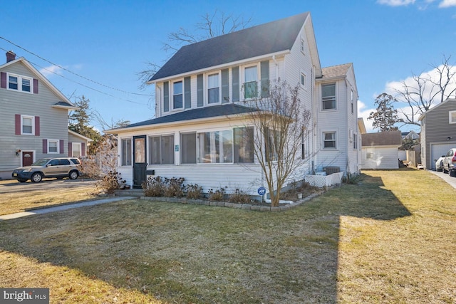 view of front facade featuring a front yard