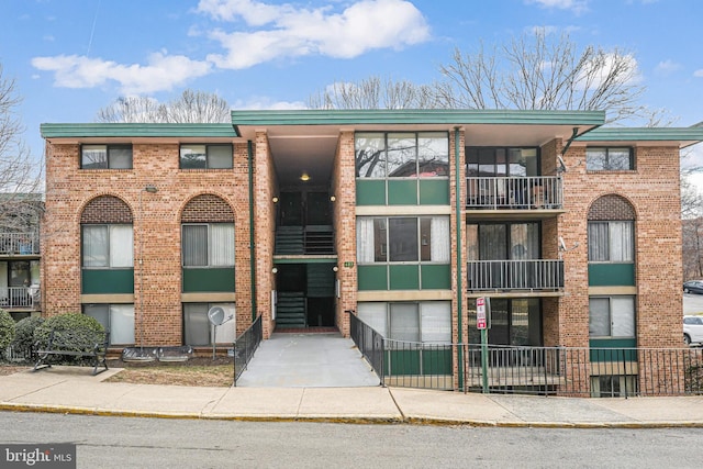 483 N Armistead St Unit T3, Alexandria, VA 22312 - view of property featuring driveway and an attached garage