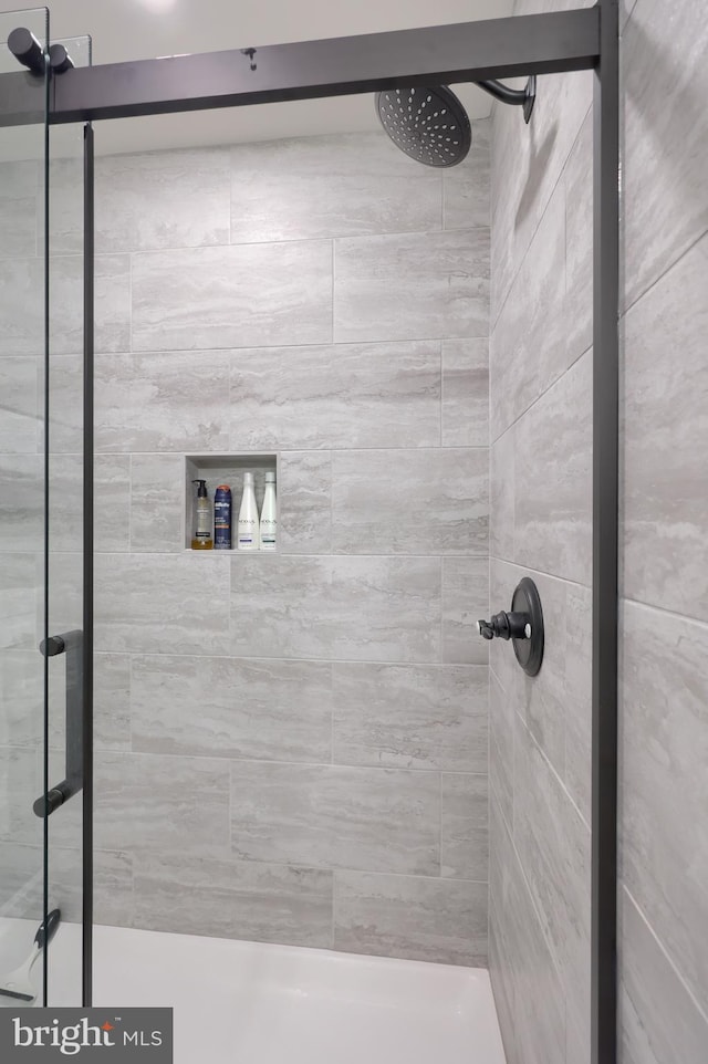 bathroom featuring a stall shower