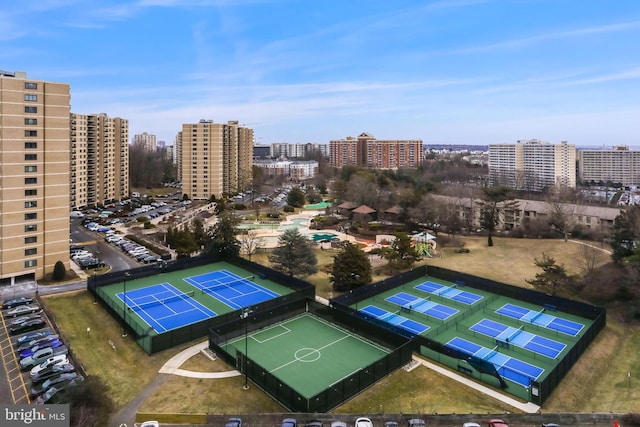 birds eye view of property with a city view