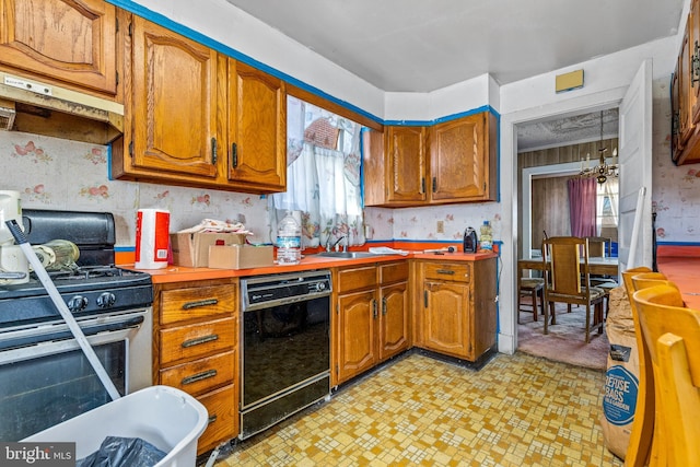 kitchen with stainless steel range with gas cooktop, a healthy amount of sunlight, dishwasher, and under cabinet range hood