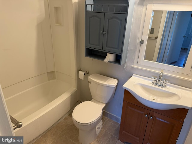 full bath featuring vanity, baseboards, shower / washtub combination, tile patterned floors, and toilet