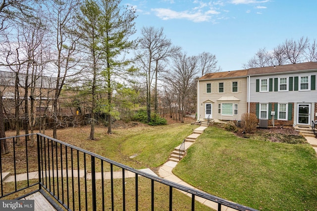 exterior space with entry steps and fence