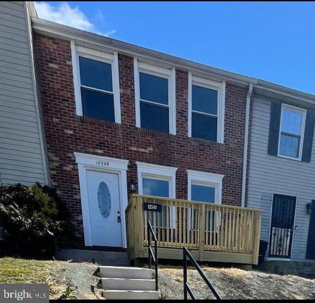 multi unit property featuring brick siding