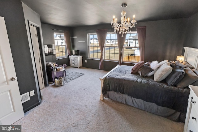 carpeted bedroom with a chandelier and visible vents