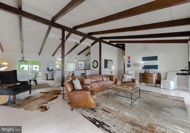 living area with high vaulted ceiling, visible vents, beamed ceiling, and light wood-style flooring