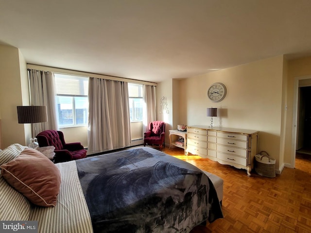 bedroom featuring baseboards