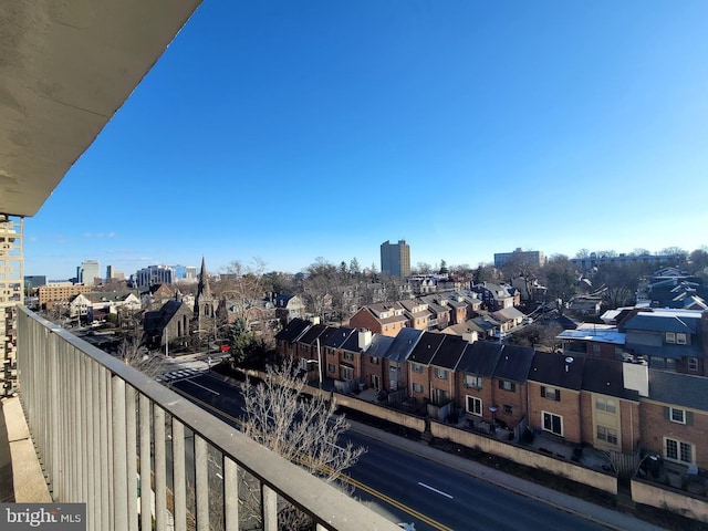 balcony featuring a city view