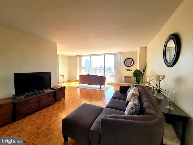 living room with floor to ceiling windows