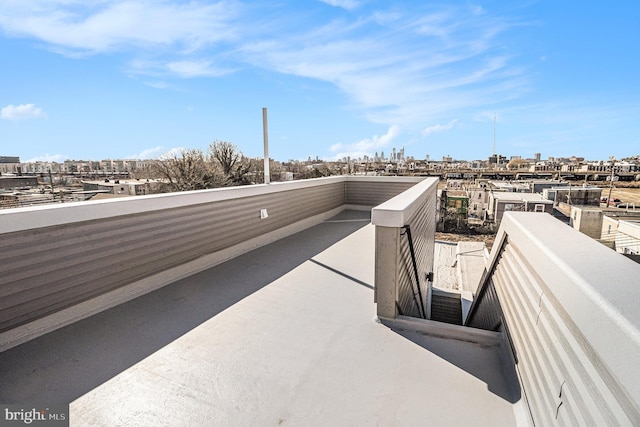 view of patio / terrace featuring a city view and a balcony