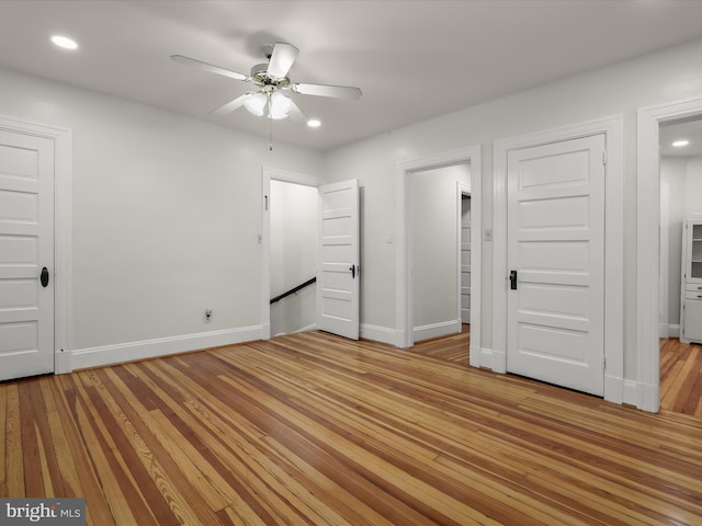 unfurnished bedroom with baseboards, ceiling fan, recessed lighting, and light wood-style floors