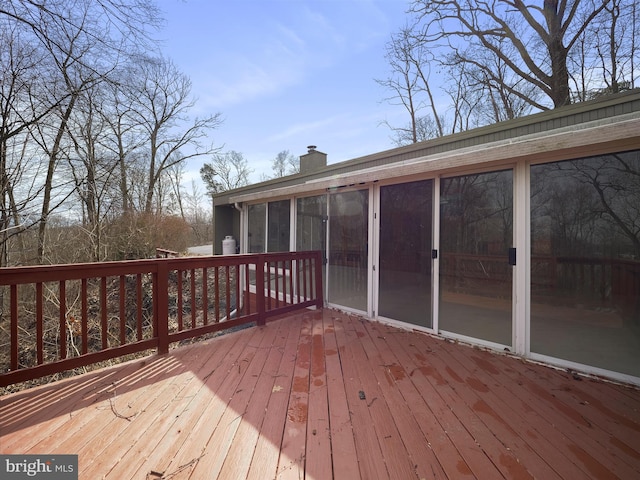 deck featuring a sunroom