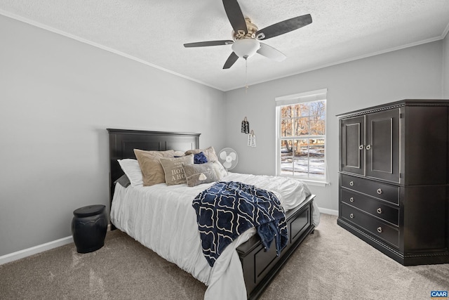 bedroom with ornamental molding, light colored carpet, a textured ceiling, and baseboards