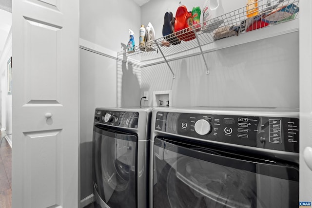 laundry area with washer and clothes dryer