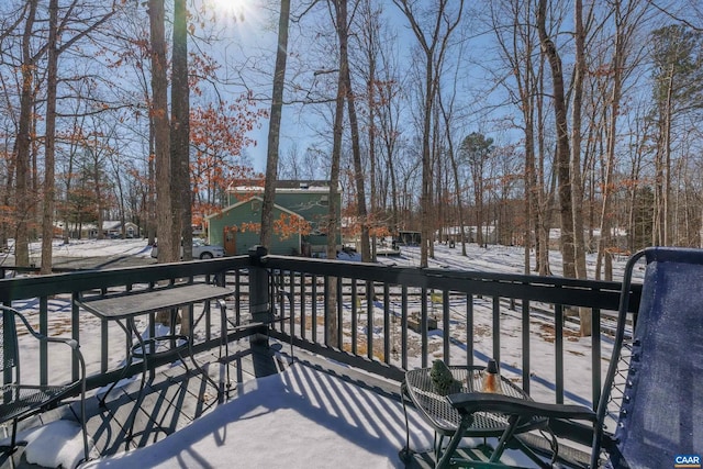 view of snow covered deck