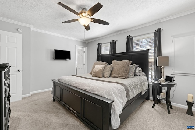 bedroom with baseboards, ornamental molding, a textured ceiling, and light colored carpet