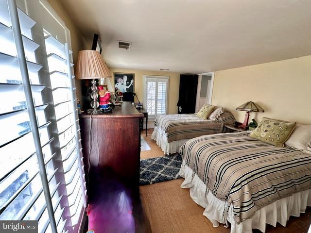 bedroom with visible vents