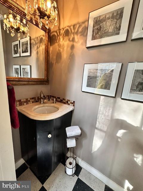 bathroom featuring vanity and baseboards