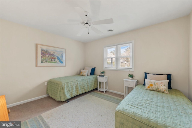 bedroom featuring carpet floors, ceiling fan, and baseboards