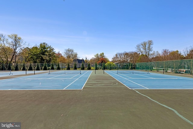 view of sport court with fence