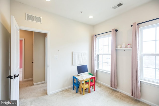 rec room featuring visible vents, carpet floors, and baseboards