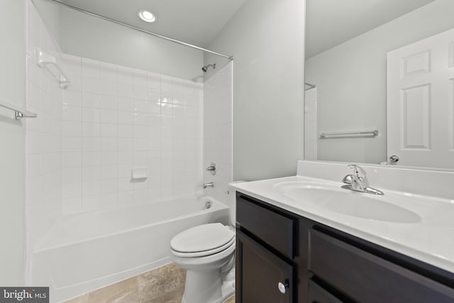 bathroom featuring toilet, bathing tub / shower combination, recessed lighting, and vanity