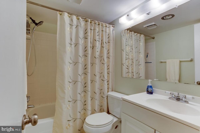 full bath with toilet, visible vents, shower / bath combo with shower curtain, and vanity