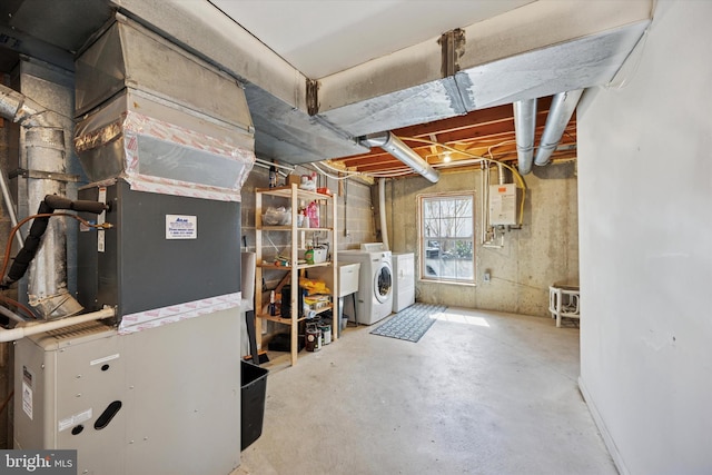 basement with washer and clothes dryer