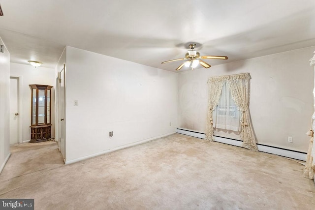 unfurnished room featuring a baseboard radiator, light carpet, and ceiling fan