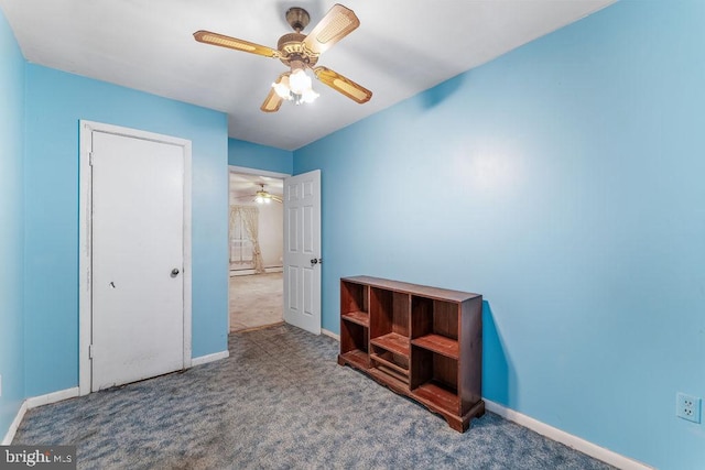 bedroom featuring carpet floors, ceiling fan, and baseboards