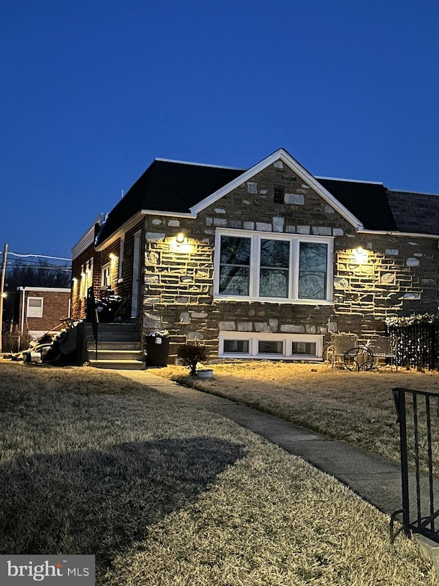 view of home's exterior with stone siding