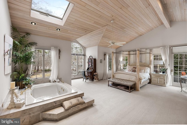 bedroom featuring vaulted ceiling with skylight, wooden ceiling, recessed lighting, light colored carpet, and access to exterior