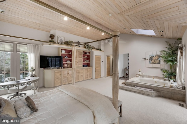 bedroom with vaulted ceiling with skylight, wood ceiling, and light colored carpet