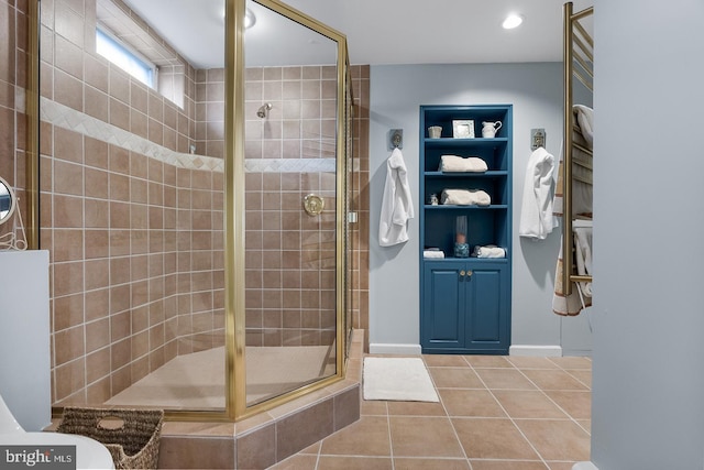 full bath with a stall shower, recessed lighting, and tile patterned floors