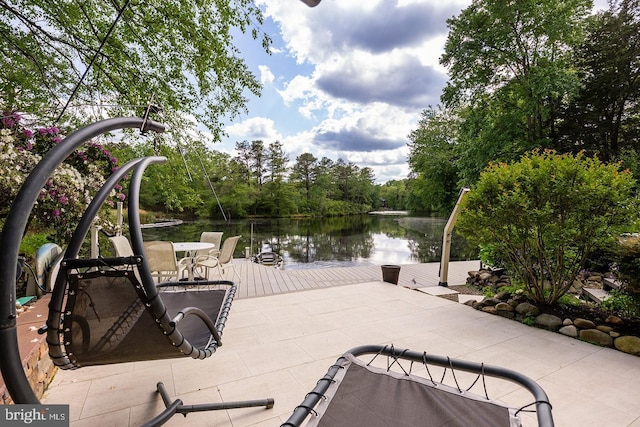 view of patio / terrace with a water view