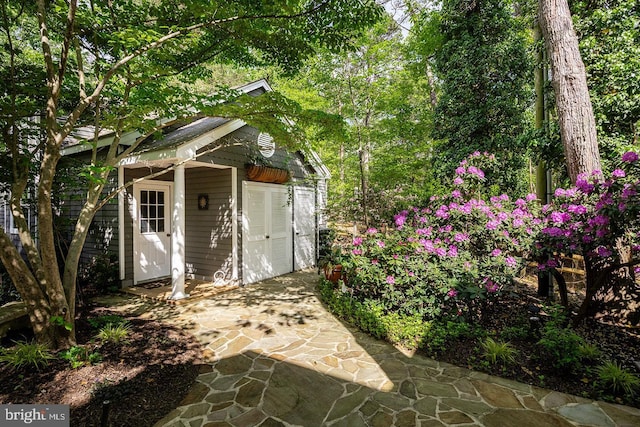 view of outbuilding featuring an outdoor structure