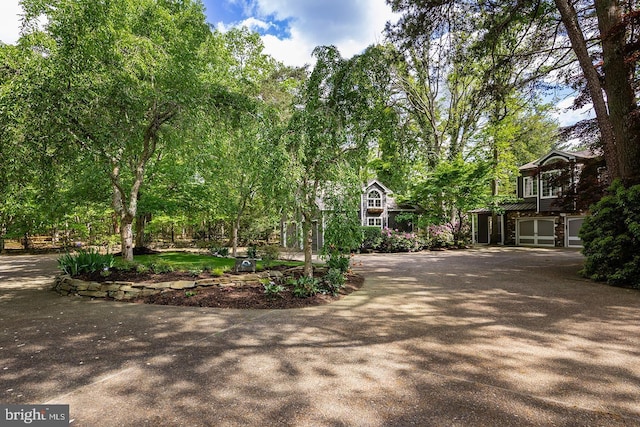 exterior space featuring driveway and an attached garage