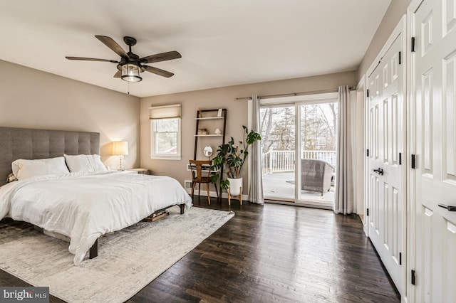 bedroom featuring ceiling fan, access to outside, baseboards, and dark wood finished floors