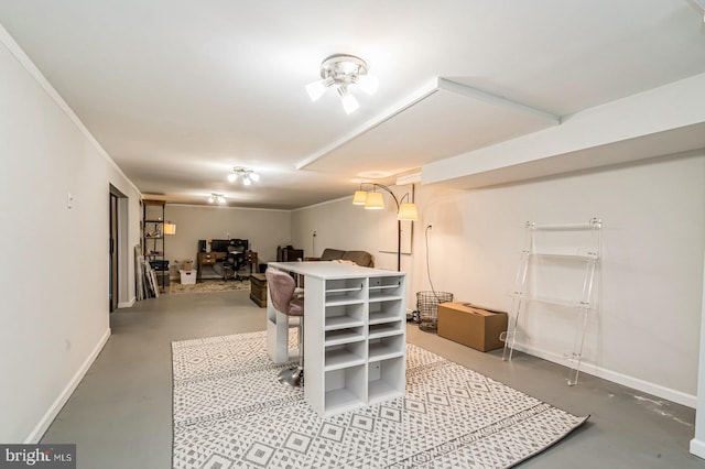 finished basement featuring baseboards