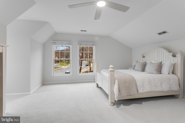 bedroom featuring vaulted ceiling, ceiling fan, carpet flooring, and visible vents