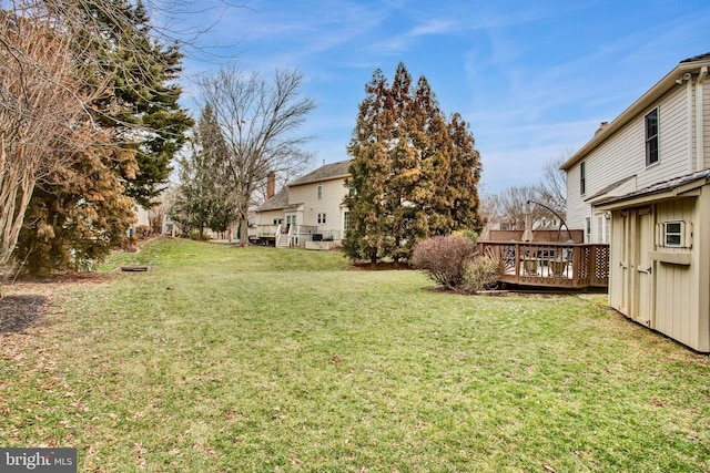 view of yard with a deck