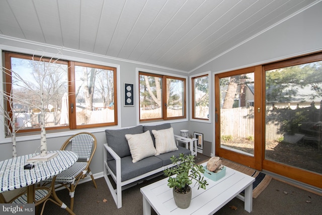 sunroom / solarium with lofted ceiling and wooden ceiling