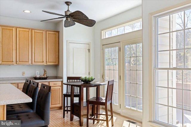 dining space featuring recessed lighting, visible vents, ceiling fan, and light wood-style flooring