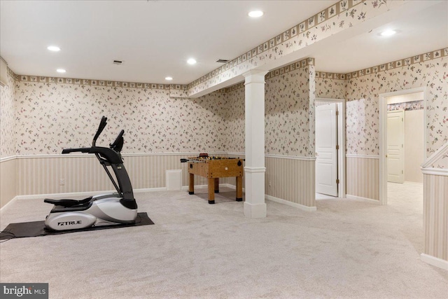 exercise room featuring recessed lighting, wainscoting, light carpet, and wallpapered walls